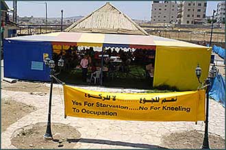 The tent, near a section of the barrier being built on the edge of East Jerusalem, where the hunger strike is being held.