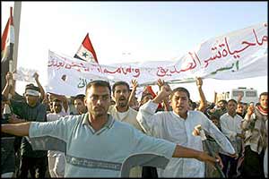 Iraqis protest against the arrest of three women to force their husbands to give themselves in to occupiers. Brutalised by sanctions, Iraqis were not as easy to frighten into submission as many believed.