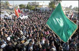 Iraqis demonstrate in front of the provincial governor's office in Hillah, south of Baghdad, calling for a free election to choose a new governor.