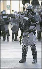 The sight of heavily armed police, acting on behalf of big business, has become common to anti-capitalist protests across the globe.