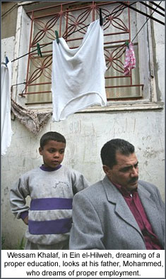 Wessam Khalaf, in Ein el-Hilweh, dreaming of a proper education, looks at his father, Mohammed, who dreams of proper employment.