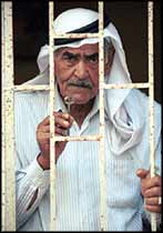 Hussein Salem Miari, originally from Aakbara in Galilee, fled fighting in 1948, and now lives in Ain El Helweh refugee camp, in Saida. He holds up the key to his home in Aakbara.